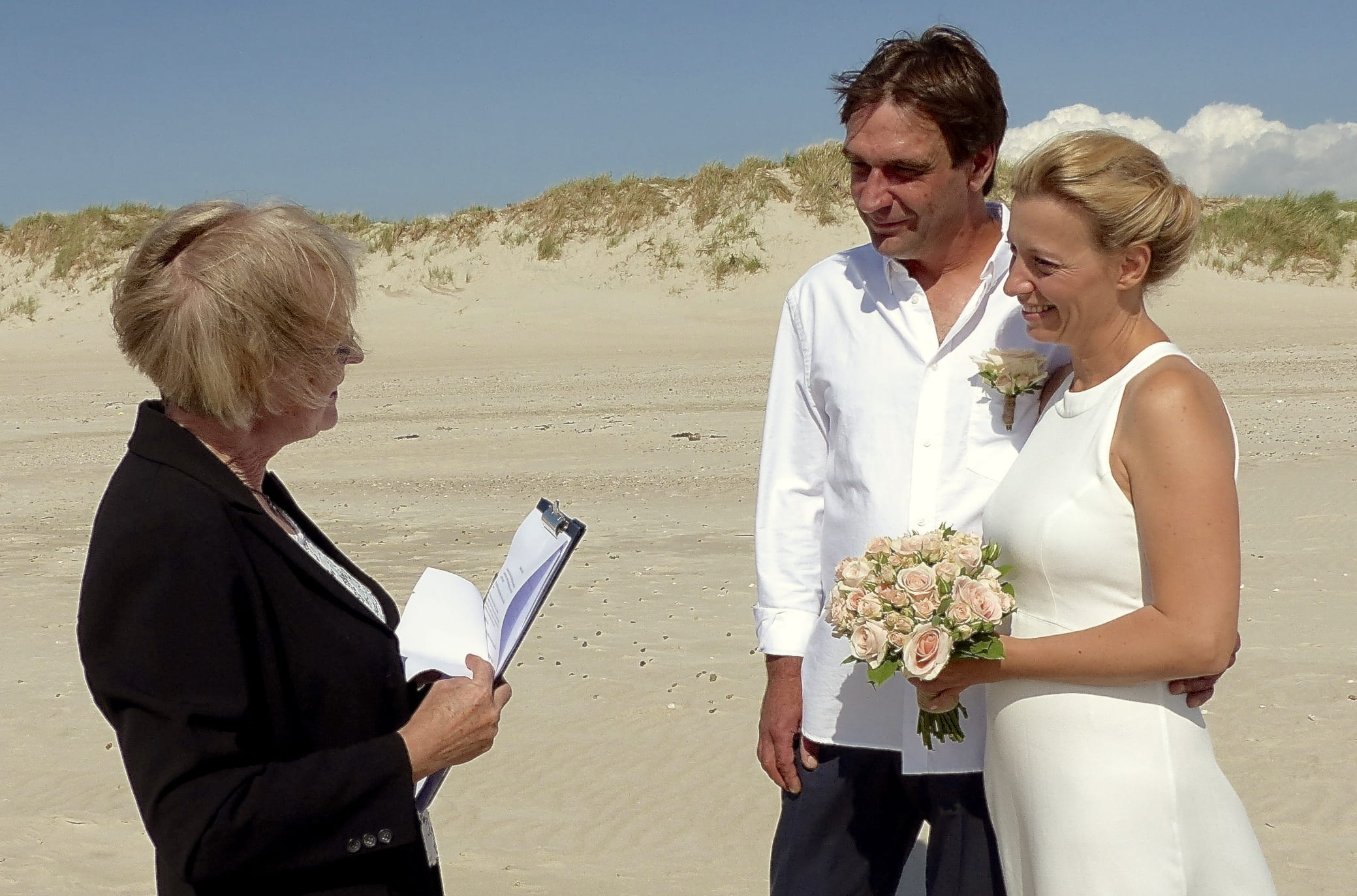 People getting married on beach